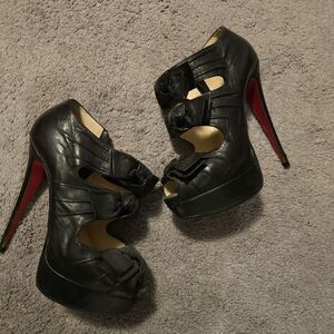 Elegant Black High Heels with Red Soles